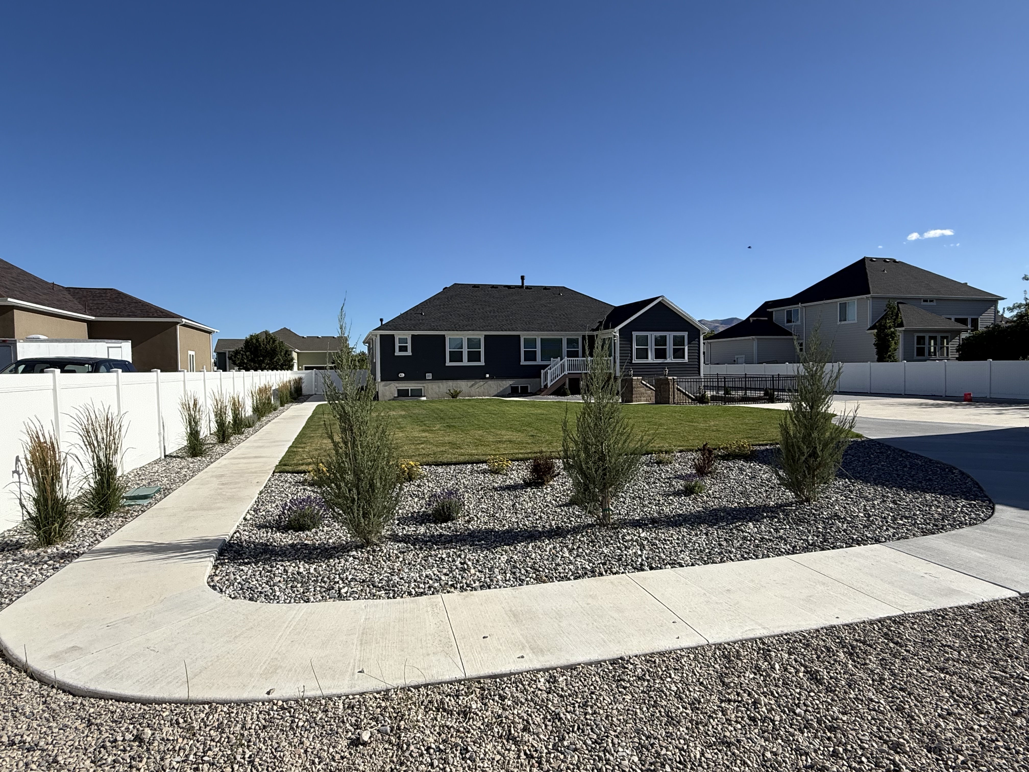 Backyard sidewalk at 2156 W Thomas St in Lehi, Utah