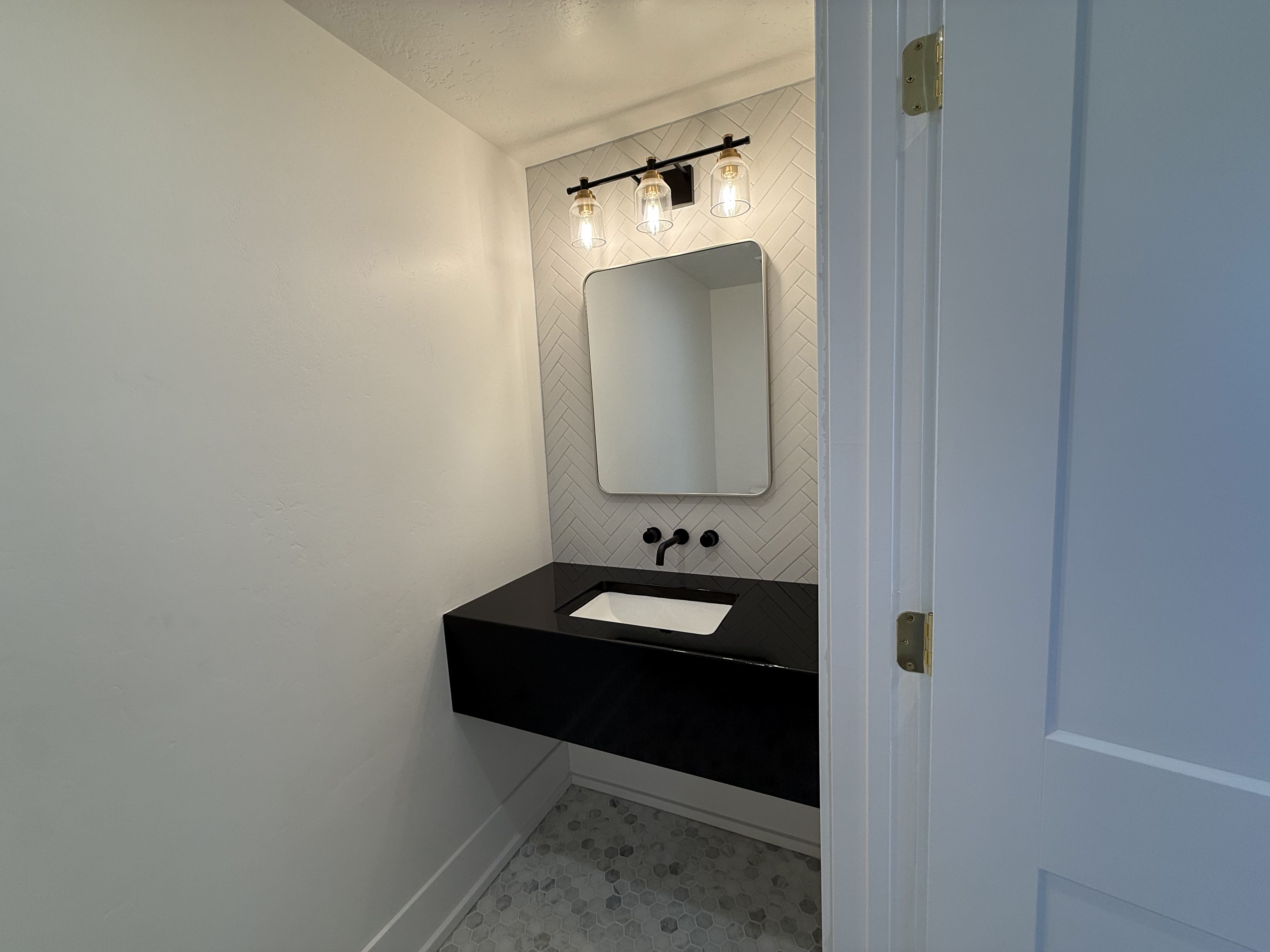 Basement half bath at 2156 W Thomas St in Lehi, Utah
